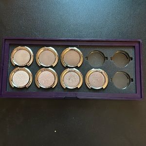7 Urban Decay Single eyeshadows in empty palette